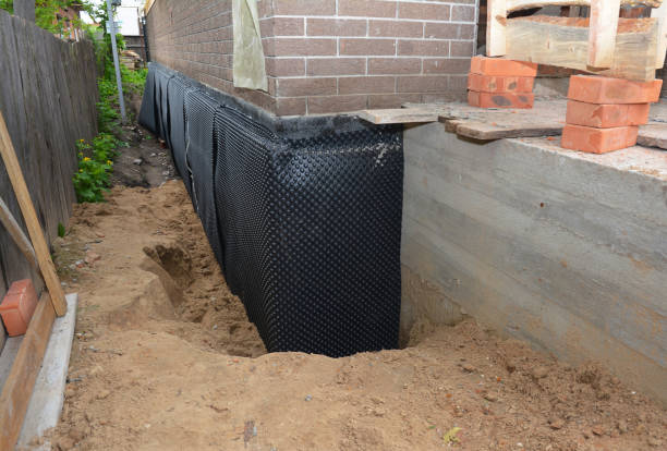 SJ Waterproofing Pros technician performing targeted Waterproofing assessment in Toms River, NJ